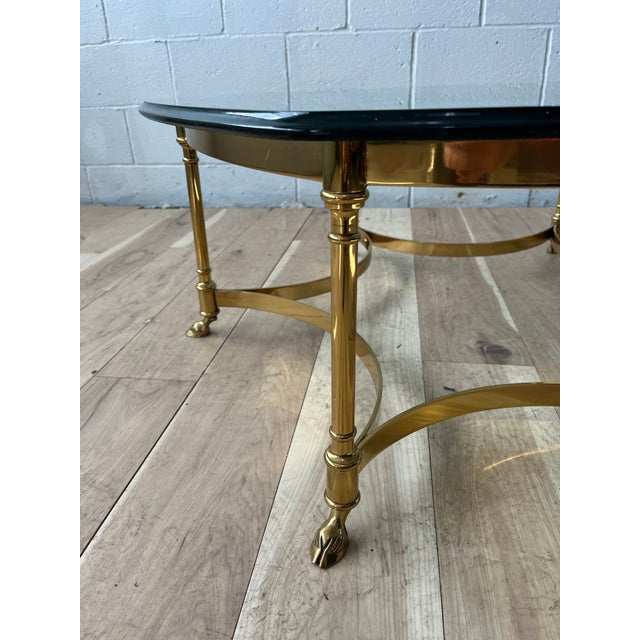 Round Hexagon Solid Brass Base Coffee Table on Hoof Feet Mid-Century Italian. Classic and versatile design with sweeping...