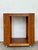 This striking vintage bar cart exemplifies the intricate craftsmanship of the late 20th-century organic modern movement....