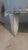 Pair of Custom Round Dove Grey Leather Ottomans For Sale In Greenville, SC - Image 6 of 7