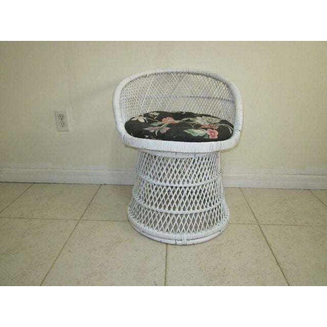 Add a touch of vintage charm to your home with this beautiful Rattan White Wicker Palm Beach Regency Chair. The chair...