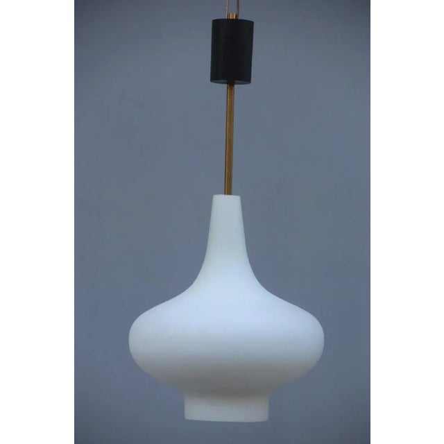 - Pair of pendants - Italian design - White glass and brass gold - Light bulbs E27, max 80 Watt - Measures: glass height...