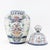 This beautiful vintage lidded vase or ginger jar features a traditional Delftware style but is decorated in a rare...