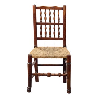Early 19th Century English Oak Spindle Back Chair With Rush Seat For Sale