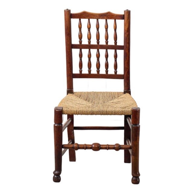 Early 19th Century English Oak Spindle Back Chair With Rush Seat For Sale