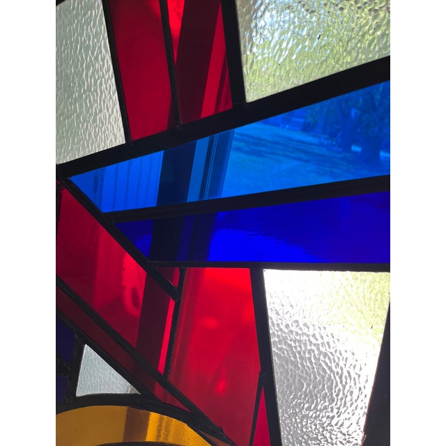 One-of-a-kind, framed, colorful, large stained glass window with contemporary geometric design signed by Erie artist Matty...
