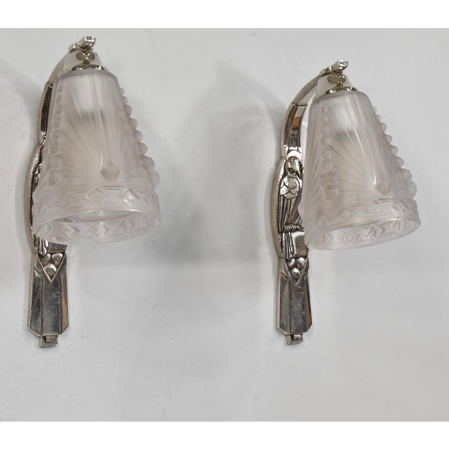 Charles Schneider A pair of French art deco birds motif wall sconces circa 1925-1935 in nickel on cast bronze or solid...