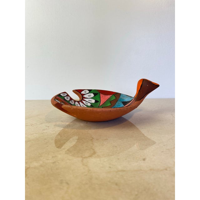 Vintage hand-molded red clay bird effigy bowl in the style of Tesuque Pueblo Native American pottery, New Mexico. Stylized...
