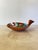 Vintage hand-molded red clay bird effigy bowl in the style of Tesuque Pueblo Native American pottery, New Mexico. Stylized...