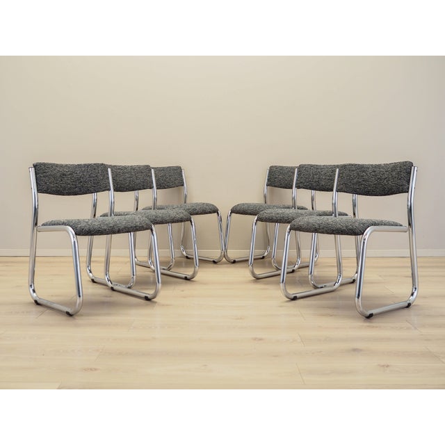 The set of six chairs was made in the 1980s, Italian production. The frame is made of metal. The chairs have new...