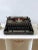 This vintage Hermes Media typewriter is more than a writing tool—it’s an elegant design object that captures the spirit of...