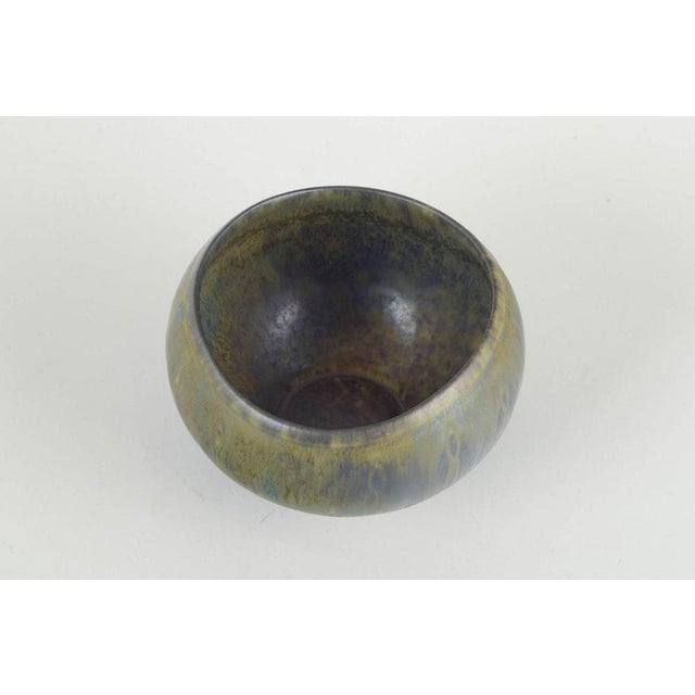 Gunnar Nylund for Rörstrand Asymmetric bowl, mid-20th century. Hand-thrown stoneware bowl with a rounded, asymmetric form...