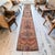 Hand-knotted in Southeastern Anatolia during the 1960s, this extra-long vintage runner was originally woven by villagers...