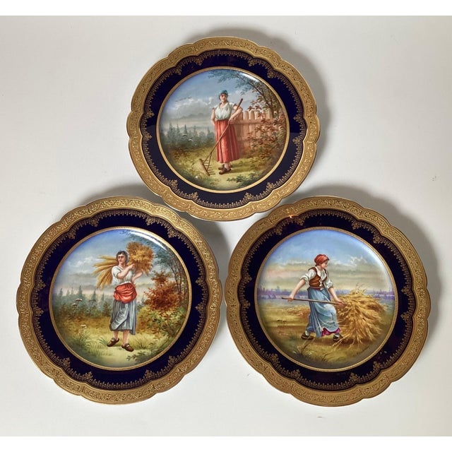 Three Sevres Gilt Heightened Porcelain Cabinet Plates, Mid 19th Century. With scalloped edges, gilt heightened and cobalt...