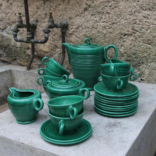 A complete glazed ceramic coffee service designed by the ceramist blanche letalle for the saint-clément factory in france...