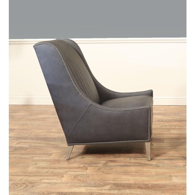 American-made channel back chairs. These chairs are shown with Juno soft blue leather, driftwood-finished frames, and nail...