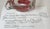 Vintage hand-blown glass art ashtray showcases a vibrant red floral design suspended within clear, heavy glass. The...