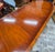English Regency Revival Flame Mahogany Oval Extension Dining Table With Satinwood Crossbanding and Brass Paw Feet, Circa 1935 For Sale - Image 9 of 9