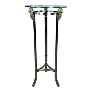 Pedestal Polished Stainless Steel Frame with 3 Brass Lion Heads & Glass Top For Sale