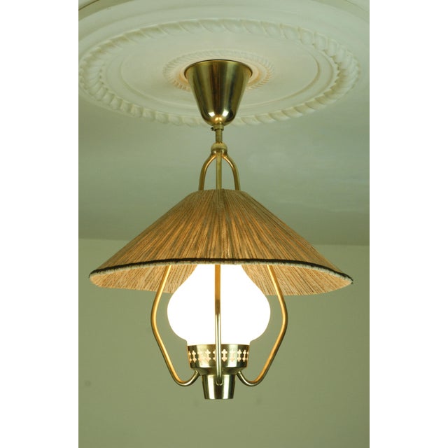 Opaline Glass and Brass Pendant Lamp by Hans Bergström for Asea Belysning, 1940s, in Flawless conditions. Designed 1920 to...