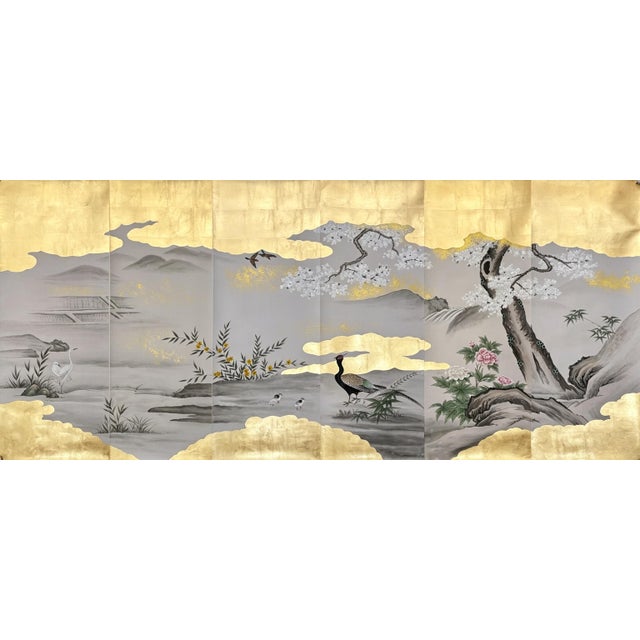Luxury artisan hand-painted gold leaf mural crafted with premium gilded gold foil accents across a serene ink-wash...