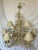 An exceptionally Beige Hammer Finish striking textured /painted iron coral-like chandelier. This gem can take center stage...