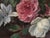 This exquisite late 19th-century French oil on canvas still life painting features an arrangement of pink and white roses...