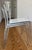 CB2 Slim Chair White and Chrome. Barely used. Excellent condition. 2016. Minimalist, curved square-cut back fit to form in...
