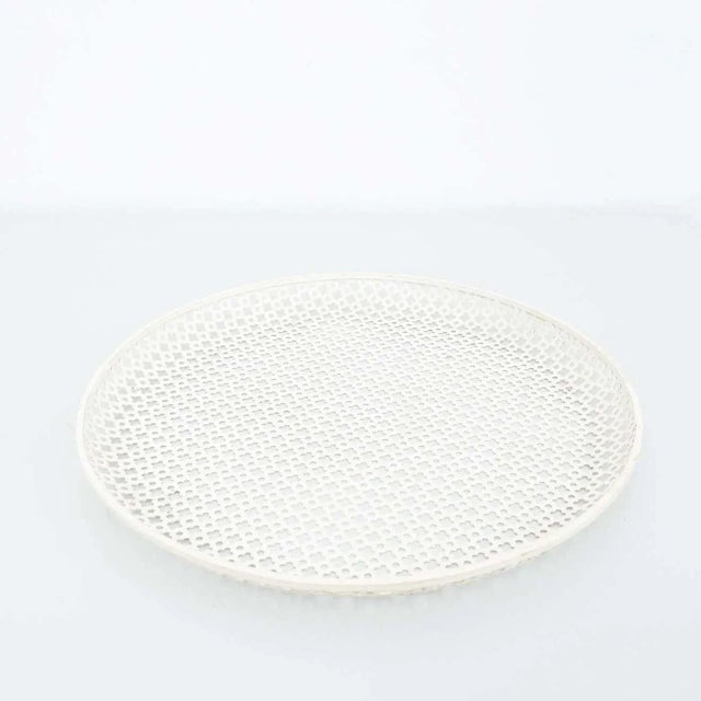 Enameled metal plate designed by Mathieu Matégot. By unknown manufacturer, circa 1950. In great original condition, with...