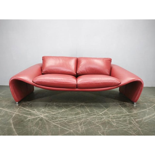 An outstanding Italian postmodern two-seat sofa produced by Divanotti during the 1990s. Distinguished by its dramatic...