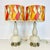 Vintage Home is pleased to present this pair of double gourd table lamps with new shades. The pair features a clay-colored...