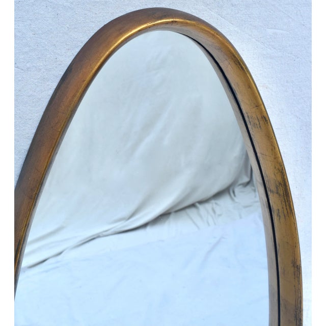 Exquisite gold gilt-wood oval mirror by LaBarge, Mid Century 20th Century Modern, Italian production 1960's; ready to...