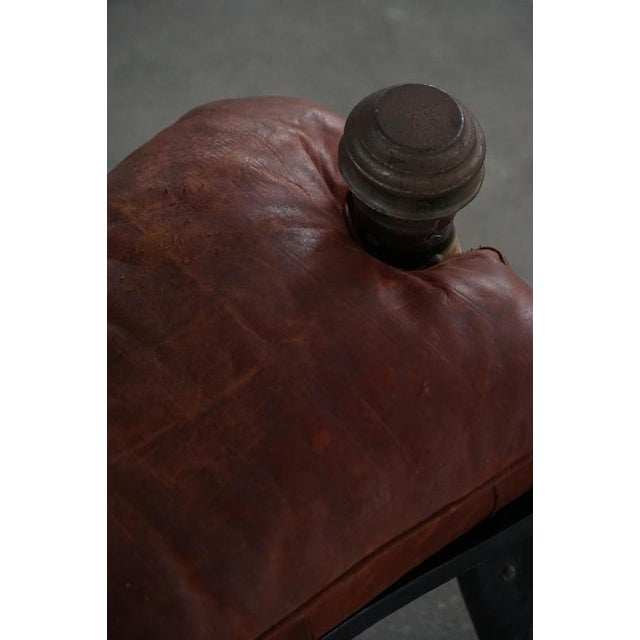 Moroccan Dark Red Upholstered Camel Saddle Ottoman, North Africa, 1940s For Sale - Image 14 of 17