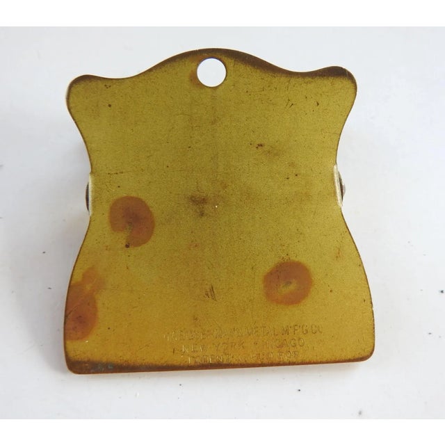 Antique circa 1920's brass bill clip. Advertising Stock Yards National Bank of South Omaha. Made by Haeusermann Metal Co....