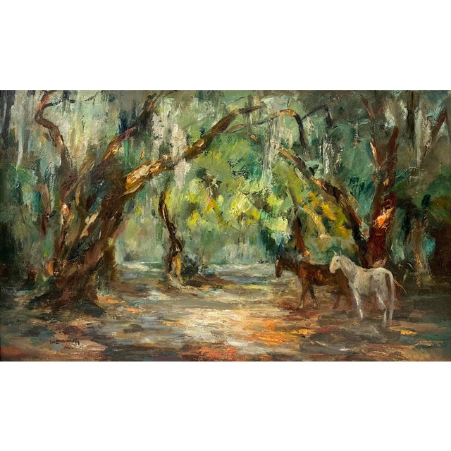 A signed oil on board painting of horses by American artist Tod Lindenmuth (1885-1976). This piece features a brown horse...