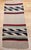 Handwoven by a Native American Navajo (Din�) artisan in the third quarter of the 20th century, this vintage rug carries...