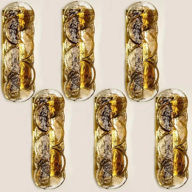 Kalmar swirl sconces wall lights with smoked citrus shaped glass, designed and manufactured in Austria, Europe by J.T....