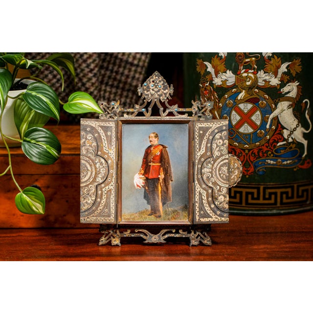 This magnificent Victorian table easel frame is a stunning tribute to 19th-century artistry. Crafted from brass, this...