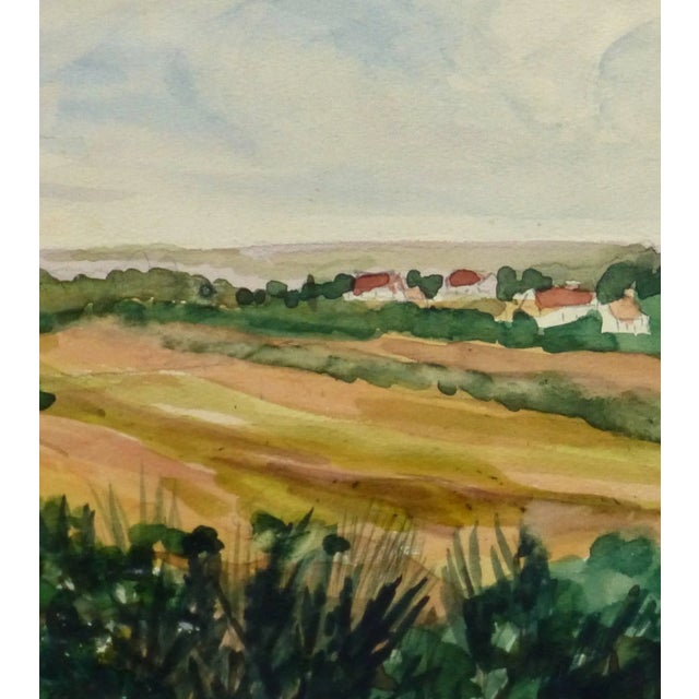 Featuring a vast country field dotted by cottages, this vintage French watercolor depicts the farming town of Bruyères,...
