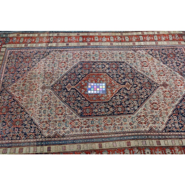 Senneh (or Sanandaj) is the seat of Kurdistan Province and weaves single-wefted, short-pile workshop pieces, primarily...