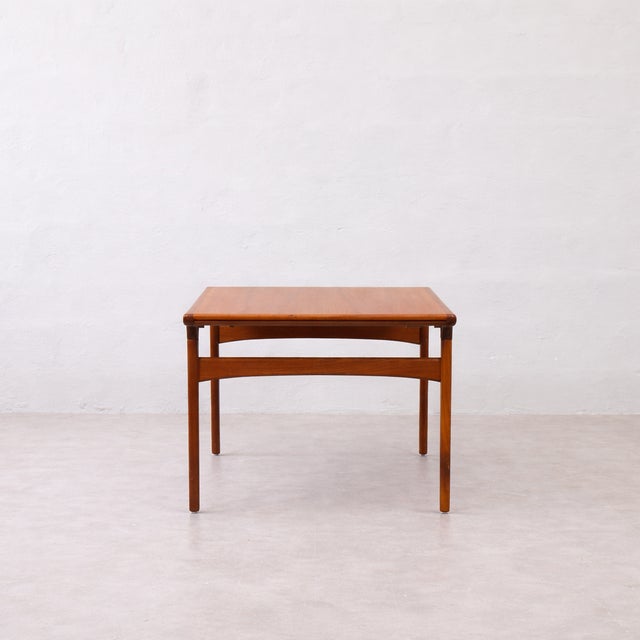 Uldum Møbelfabrik Teak Dining Table with Hidden Extension Leaf by Johannes Andersen for Uldum Møbelfabrik, Denmark, 1960s For Sale - Image 4 of 10