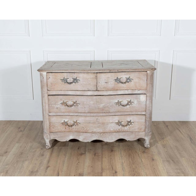 18th Century French Louis XV Bleached Oak Curved Commode with Parquet Top A graceful example of 18th-century French...