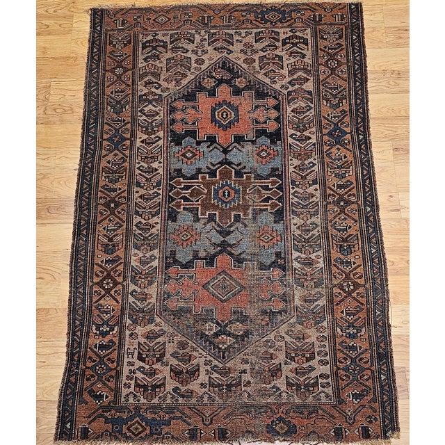 An exceptional 19th-century Persian Malayer area rug, masterfully handwoven circa the late 1800s. This vintage piece...