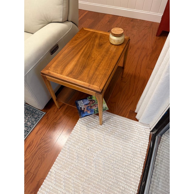 A beautifully restored Lane Rhythm Collection end table, Style No. 997-45, crafted in Altavista, Virginia. This authentic...