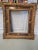 Elegant and decorative pair of 19th-century frames crafted in carved and painted wood, inspired by Renaissance aesthetics....
