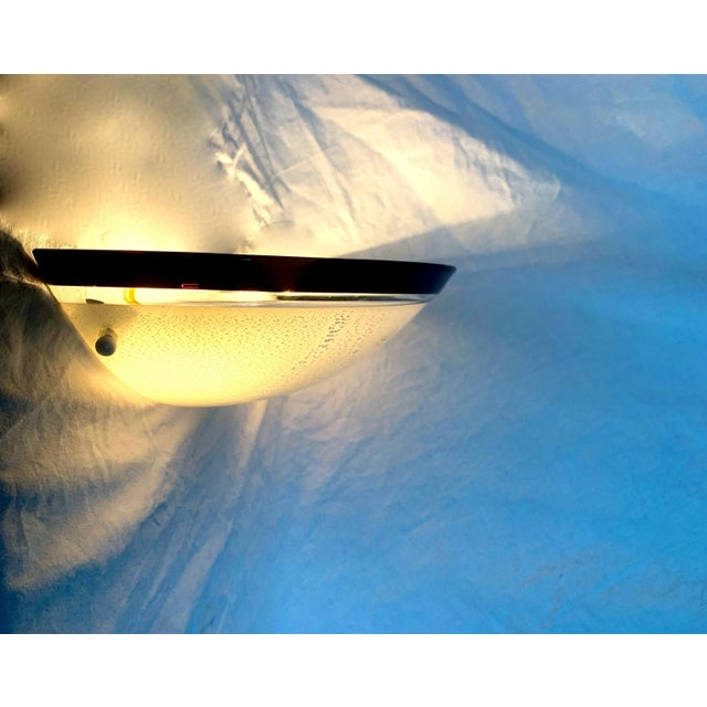 Fascinating objects of the company Murano Due produced in the 1970s or so . The objects are made up of an iron structure...