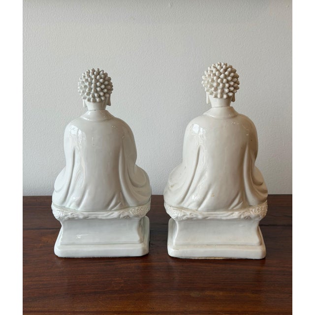 Pair of Vintage White Glazed Porcelain Buddha Figures For Sale - Image 4 of 5