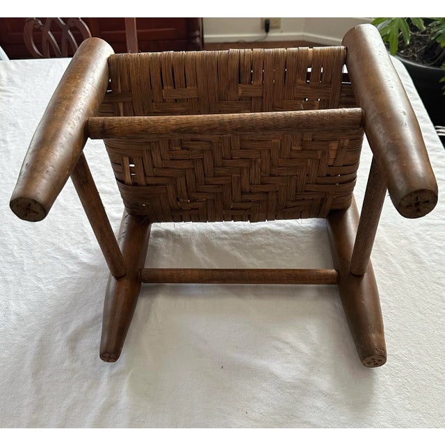 Vintage wooden stool with woven top. Rustic / country appeal. 11” seat height