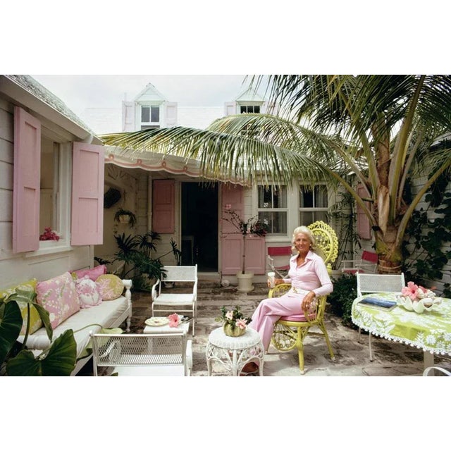 Caribbean Patio 1973 by Slim Aarons Slim Aarons Limited Estate Edition A woman relaxing on a patio, Caribbean, March 1973....