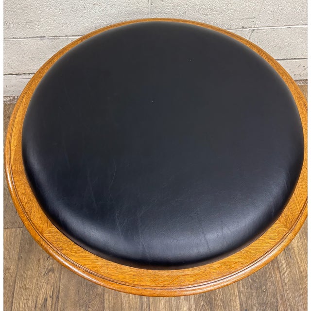 This is a gorgeous vintage Louis XV style carved walnut and vinyl ottoman or stool. Solid and sturdy, with only minor...