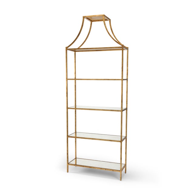 This is a Chelsea House Inc gilt shelf. The piece is made of iron and features an antique gold leaf finish. It's a part of...